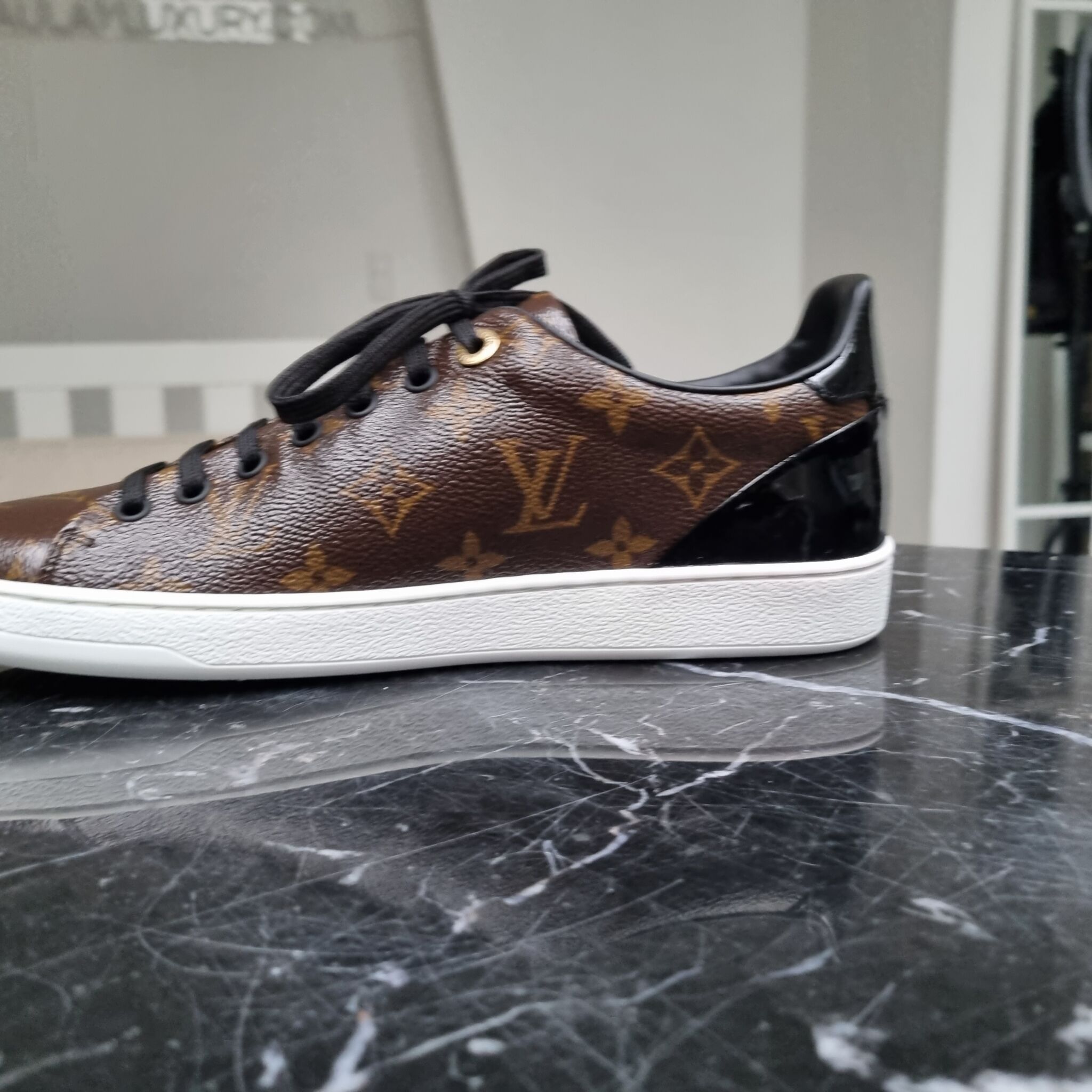Louis Vuitton 2017 LV MonogramRose Gold Frontrow Lace Up Sneakers Sz 375  For Sale at 1stDibs  louis vuitton gold shoes