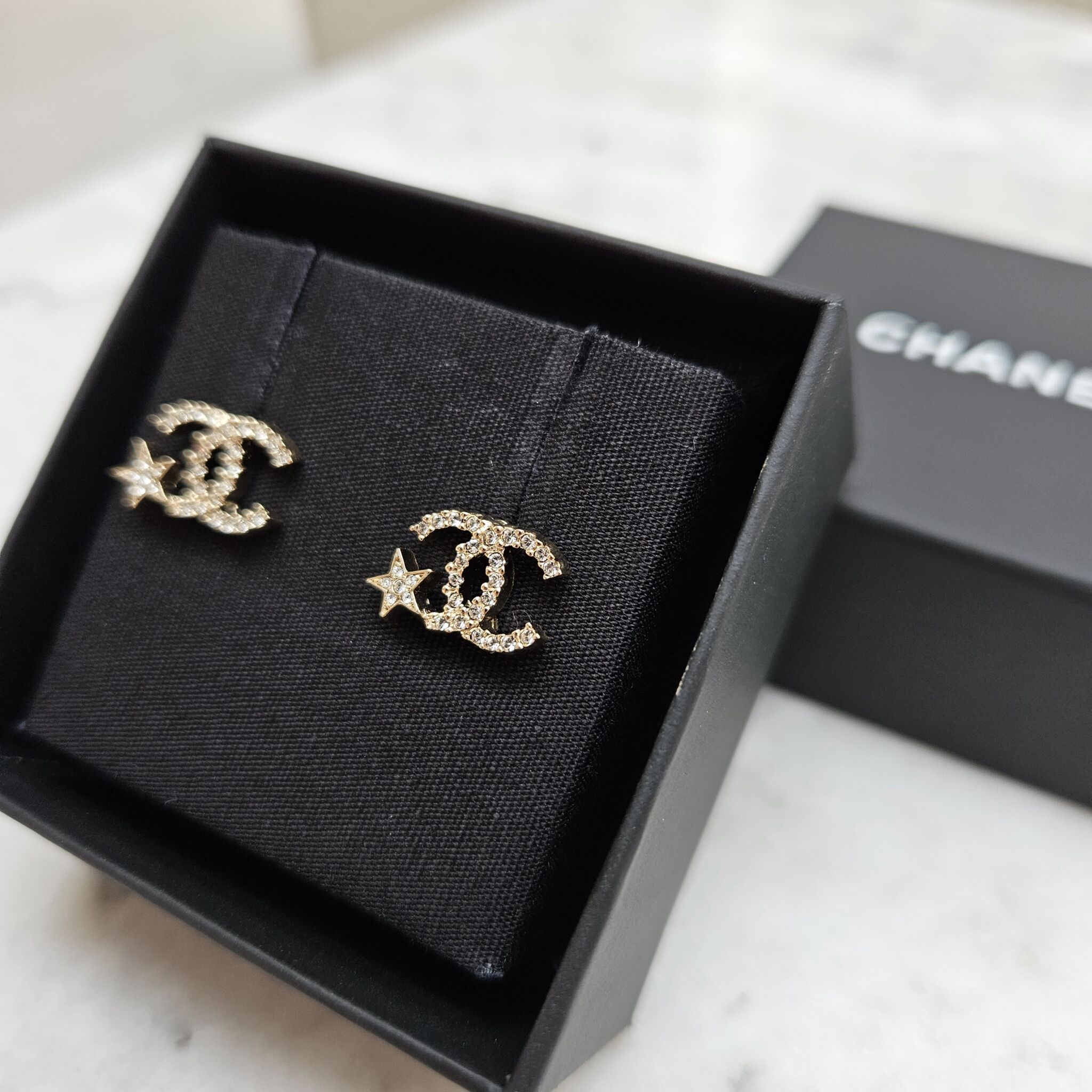Vintage Pair of Authentic Chanel Earrings Silver set with Rhinestones   Artedeco  Online Antiques