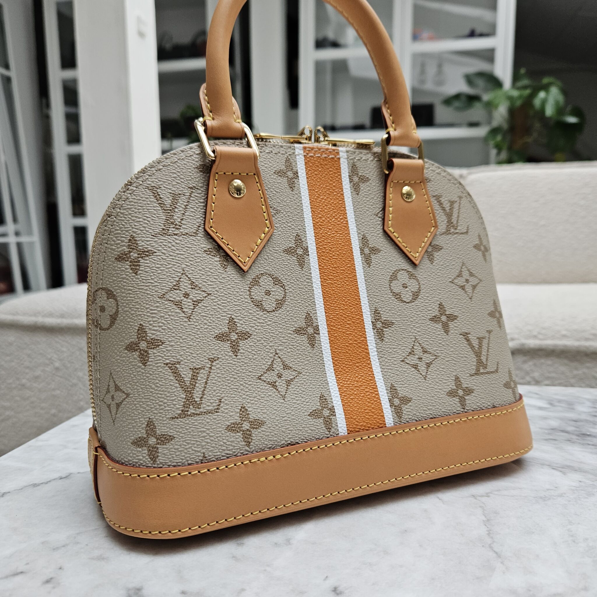 Louis Vuitton Alma BB Beige/Ocher in Monopaname Coated Canvas with