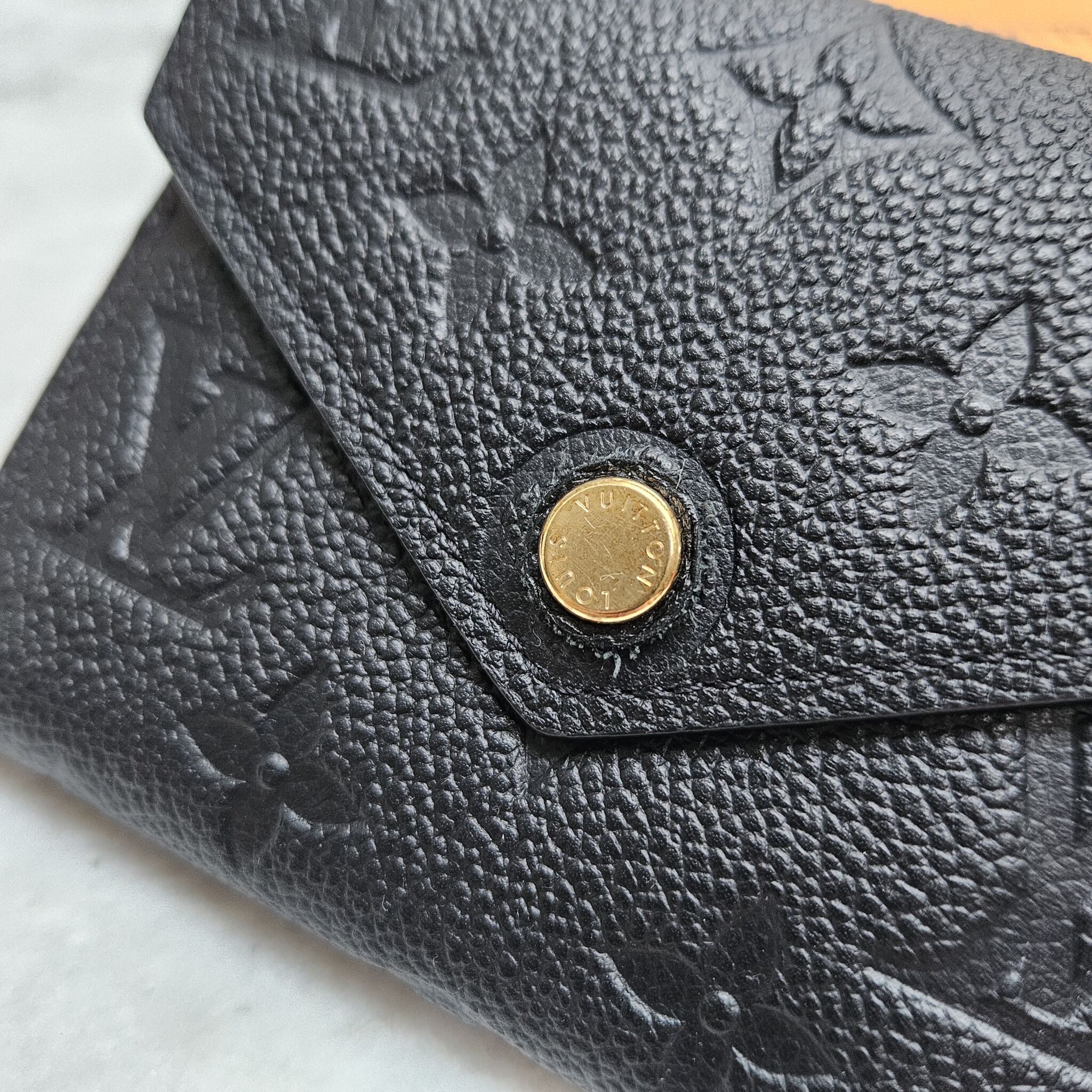 Louis Vuitton Victorine Wallet In Black Empreinte